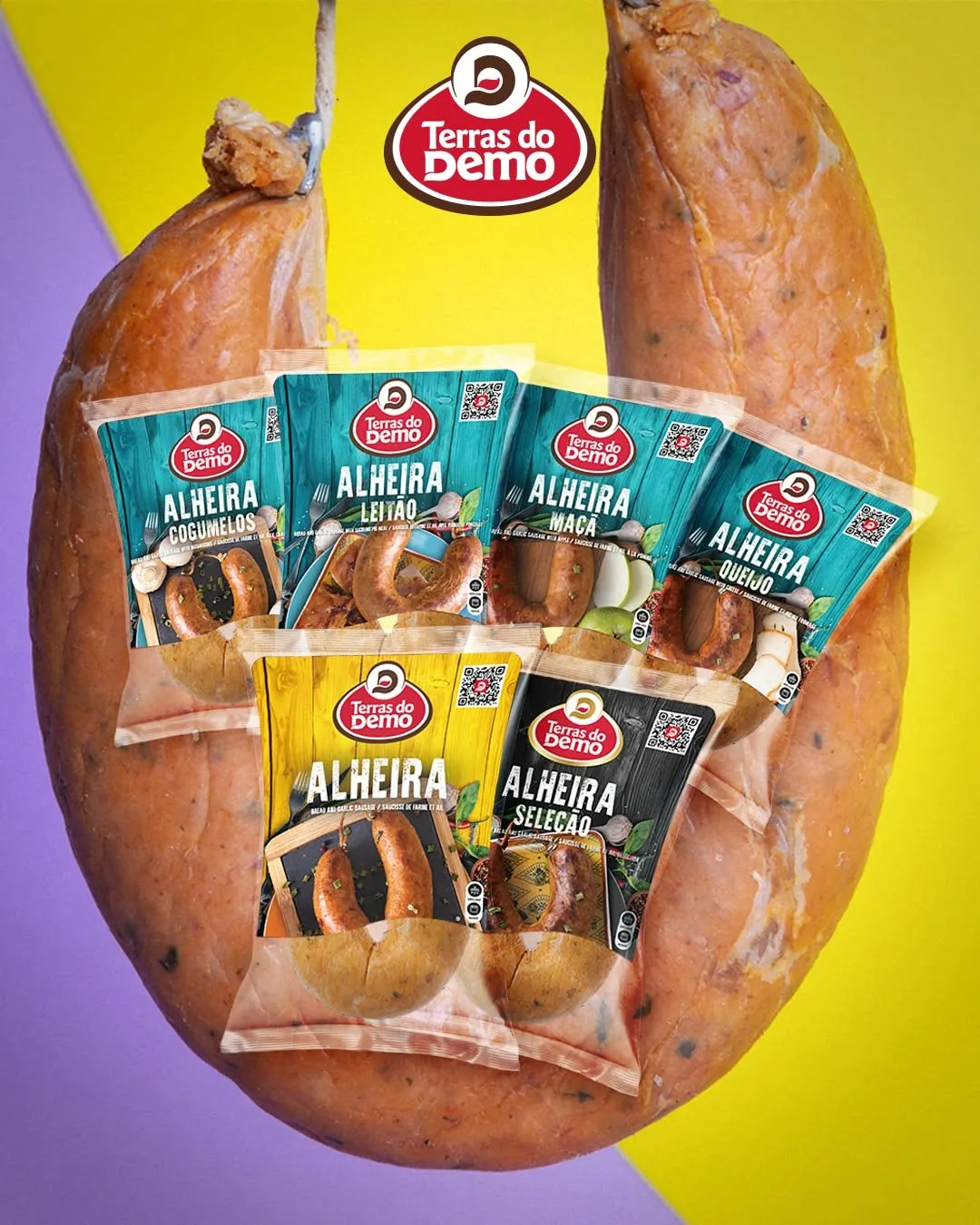 Gama de alheiras Terras do Demo: cogumelos, leitão, maçã, queijo, tradicional e Seleção, sobre uma alheira gigante